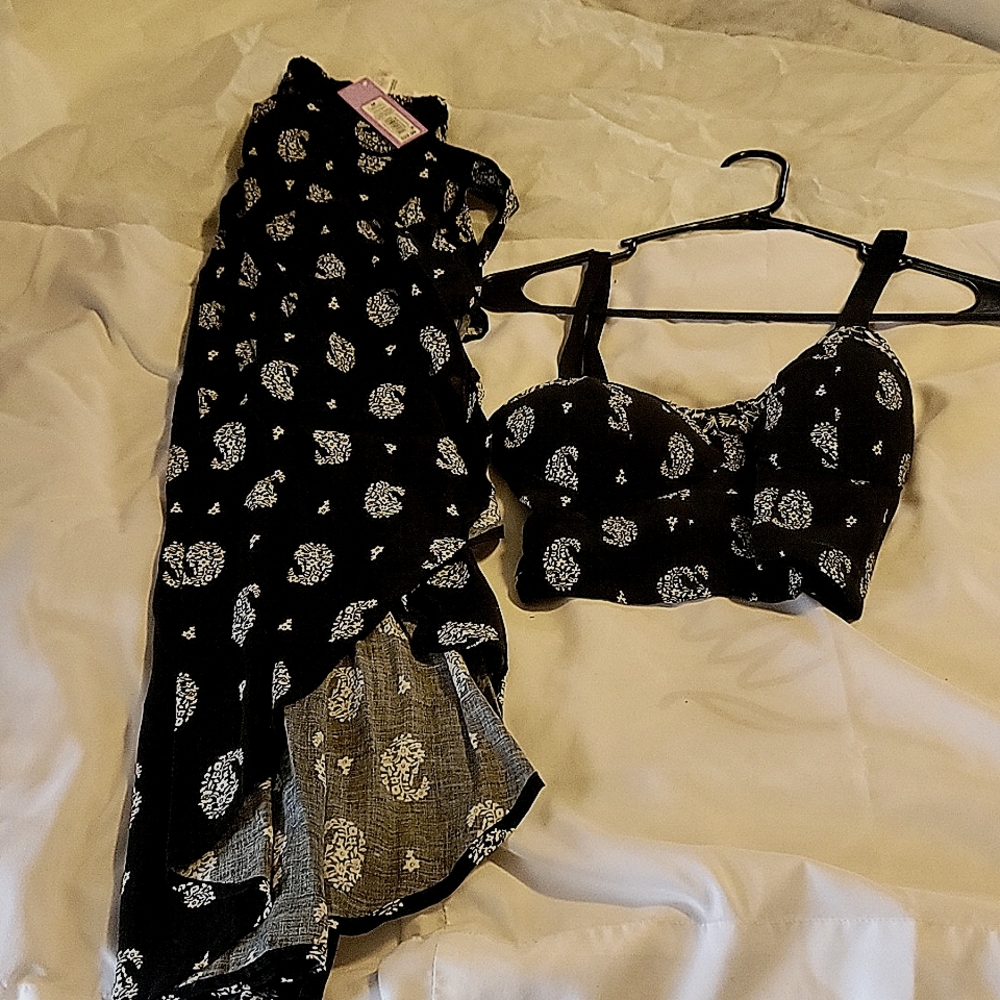 Two peice new with tags black and white top and long skirt with split tie up